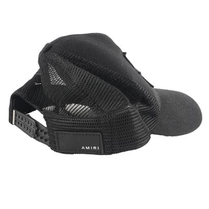 AMIRI
Casquette noire. Trois étoiles en cuir...