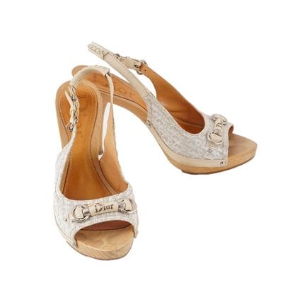 DIOR
Escarpins à bride arrière en bois, cuir...
