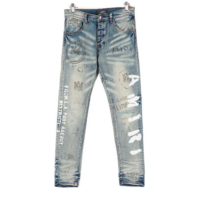 AMIRI 
Jean bleu coupe skinny en denim élastique....