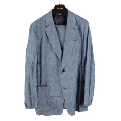 LOUIS VUITTON
Complet en tissu chiné bleu....