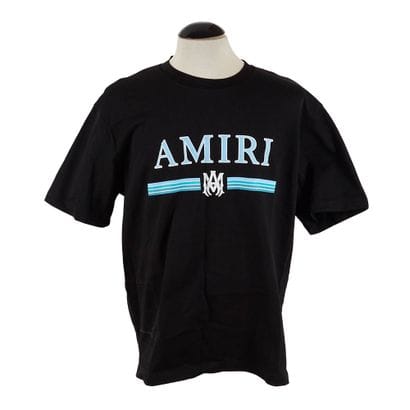 AMIRI
T-shirt noir avec bande bleues
Taille...