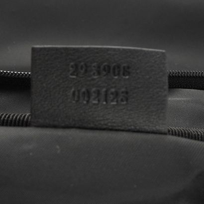 GUCCI
Gucci Monogram canvas rolling suitcase...