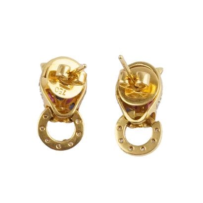 DANS LE GOÛT DE CARTIER PANTHÈRE
Boucles...