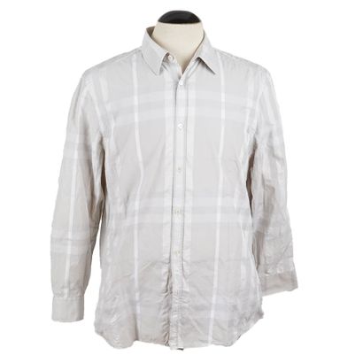 BURBERRY
- Chemise à carreaux signatures...