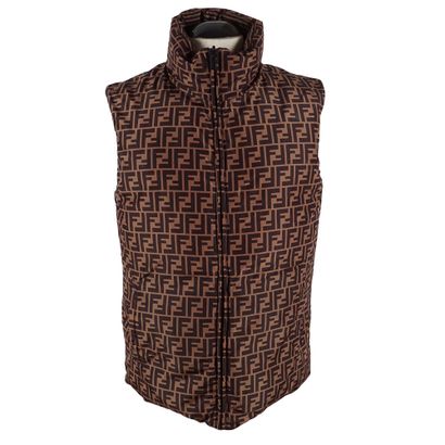 FENDI
Doudoune sans manches réversible beige...