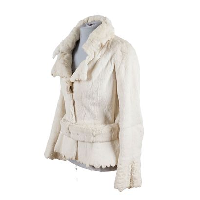 FOURRURE
Manteau de fourrure couleur crème...