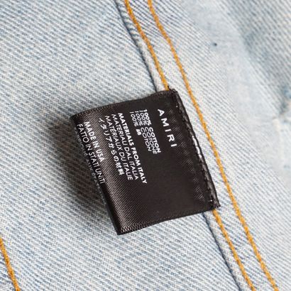 AMIRI
Veste à boutons en denim agrémentée...