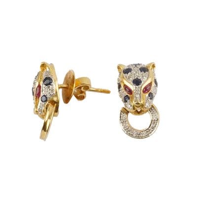 DANS LE GOÛT DE CARTIER PANTHÈRE
Boucles...