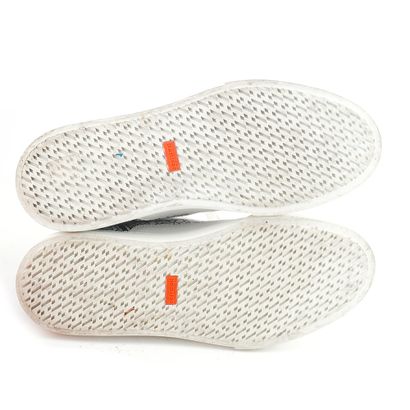 HERMÈS
Baskets Hermès District en cuir blanc...