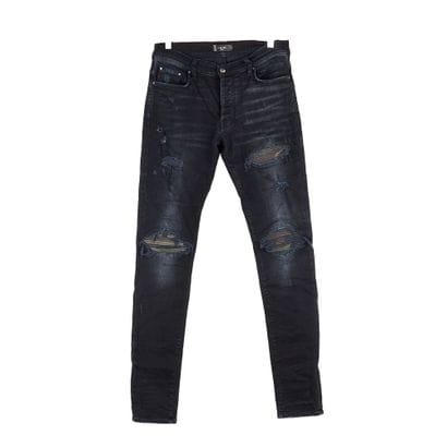 AMIRI
Jean noir coupe skinny en denim élastique....