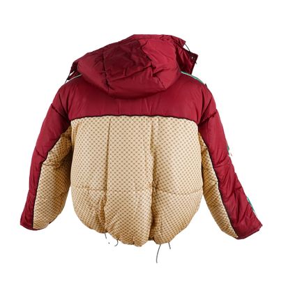 GUCCI
Doudoune à capuche beige et bourgogne
Taille...