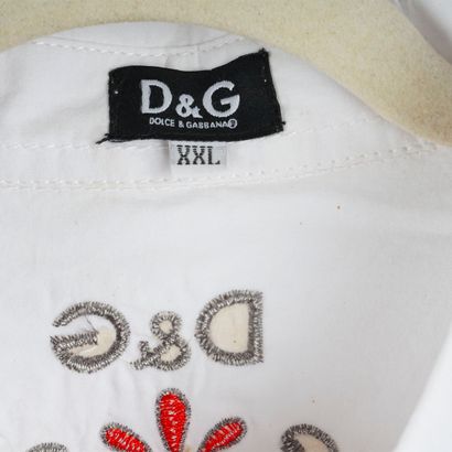 DOLCE GABBANA
Chemise blanche à motifs floraux...