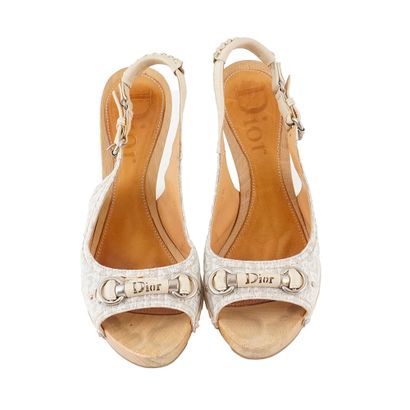 DIOR
Escarpins à bride arrière en bois, cuir...