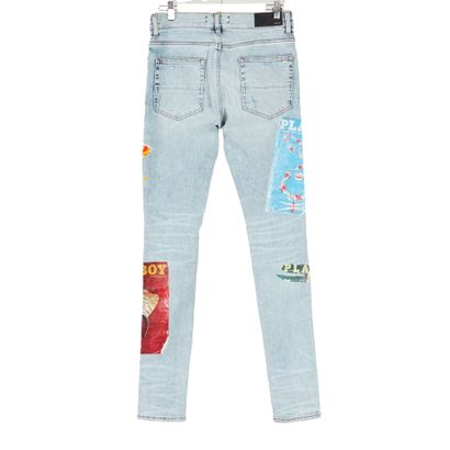 AMIRI X PLAYBOY 
Jean bleu clair en coton...