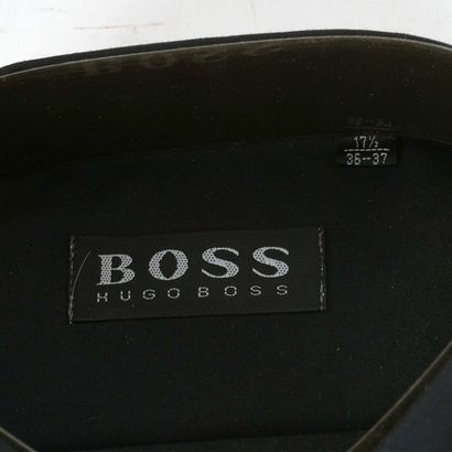HUGO BOSS | JOHN VARVATOS
Deux chemises noires,...