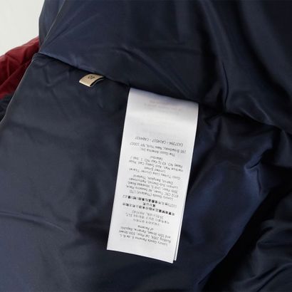 GUCCI
Doudoune à capuche beige et bourgogne
Taille...