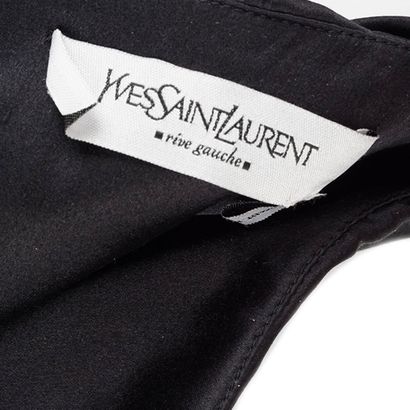 YVES SAINT LAURENT
Black lined silken skirt...