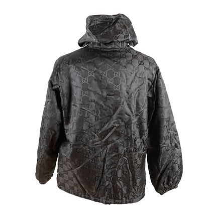 GUCCI
Manteau à capuche gris foncé GG
Taille...