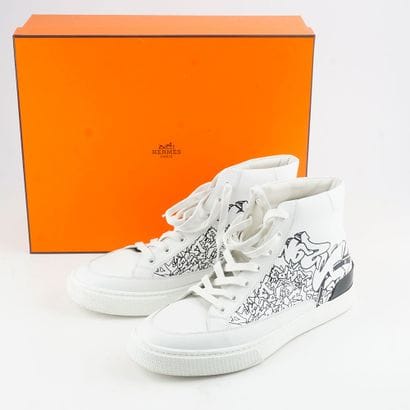 HERMÈS
Baskets Hermès District en cuir blanc...
