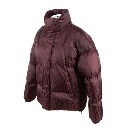 CHRISTIAN DIOR
Doudone de couleur bourgogne,...