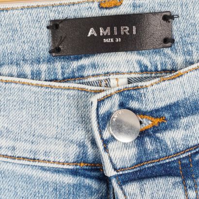 AMIRI X PLAYBOY 
Jean bleu clair en coton...