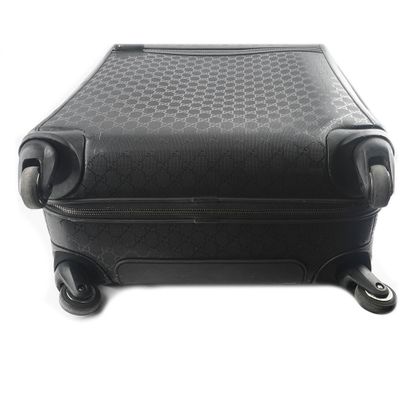 GUCCI
Gucci Monogram canvas rolling suitcase...
