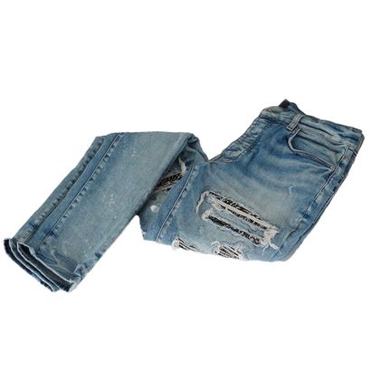 AMIRI
Jeans avec déchirures
Taille 31
Jeans...