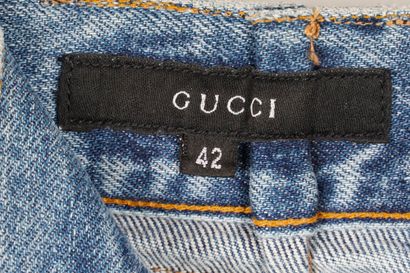 GUCCI
Gucci mid-length distressed denim skirt...