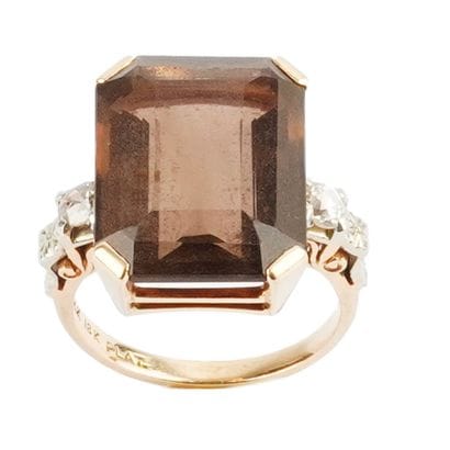 OR 14K, TOPAZE, DIAMANTS 
Bague en or jaune...
