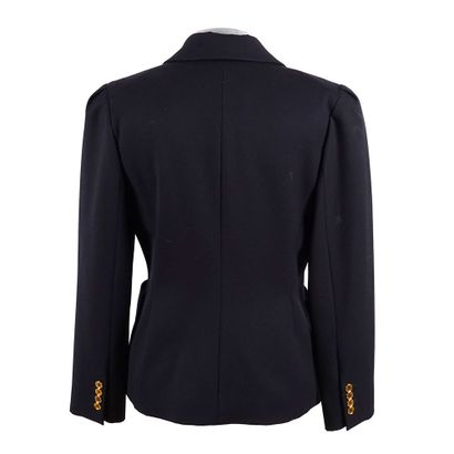 CELINE
Navy blue tailored jacket fastened...
