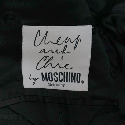 MOSCHINO
Veste tailleur de laine noire dont...