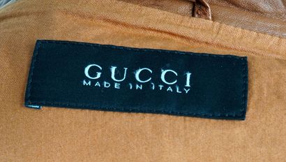 GUCCI 
Manteau de cuir marron avec manches...