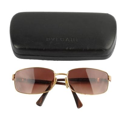 BULGARI
Monture en métal doré. Verres teintés...