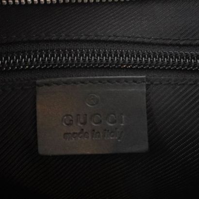 GUCCI
Gucci messenger bag in black canvas...