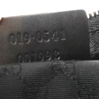 GUCCI
Gucci briefcase in black canvas and...