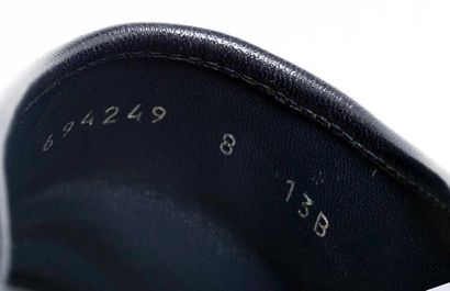 GUCCI
Grey canvas mules featuring the GG...