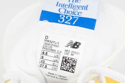 NEW BALANCE 
327 Yellow and white nylon sneakers...