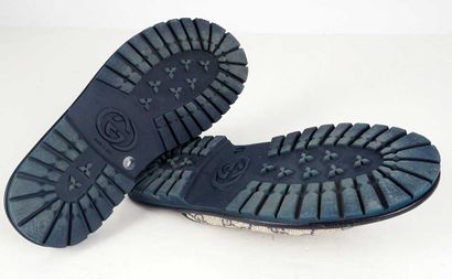 GUCCI
Grey canvas mules featuring the GG...