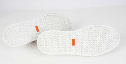 HERMÈS
‘Keep’ white leather mules with brown...