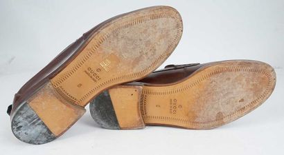 GUCCI
Brown leather penny loafers. 
Men's...