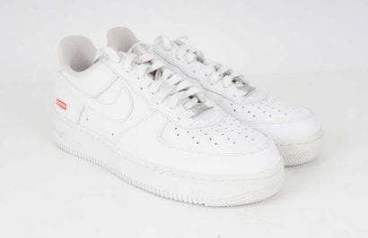 NIKE X SUPREME
White leather Air Force 1...