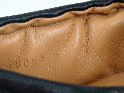 DRIES VAN NOTEN
Black padded leather loafers....