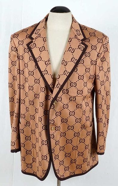 GUCCI
Beige wool blazer with GG monogram...