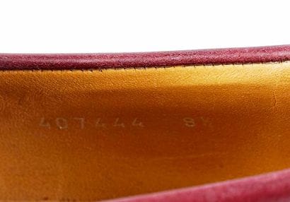 GUCCI
Burgundry leather penny loafers. 
Men's...