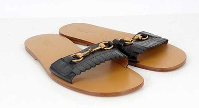 GUCCI
Brown ‘Malaga Kid’ sandals with a black...