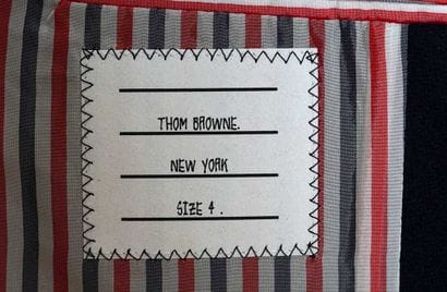 THOM BROWNE
Navy blue wool tailored jacket...