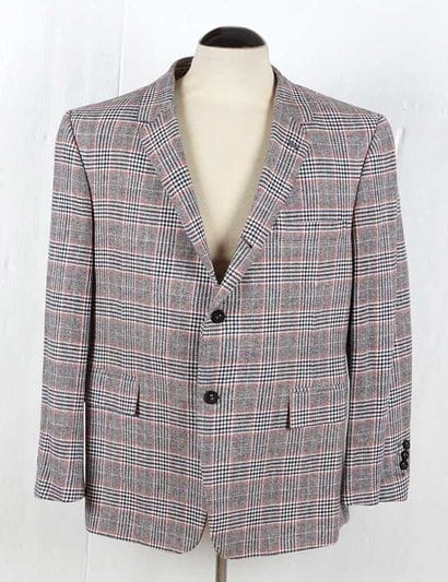 THOM BROWNE
Prince of Wales check suit jacket...