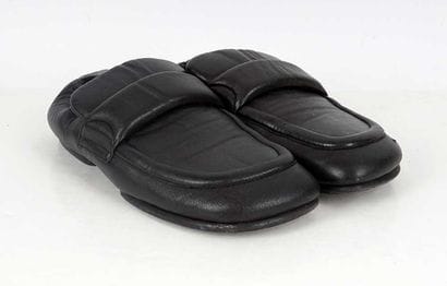DRIES VAN NOTEN
Black padded leather loafers....