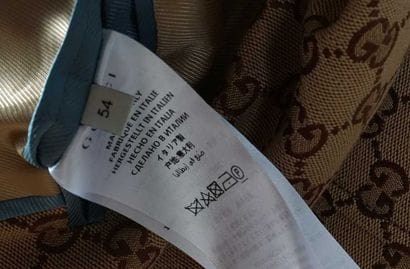 GUCCI 
Brown GG monogrammed blazer with a...