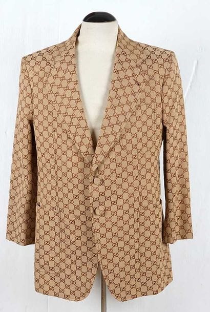 GUCCI 
Brown GG monogrammed blazer with a...